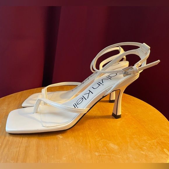 Calvin Klein Millie Ankle Strap Sandal in White. - Picture 14 of 15